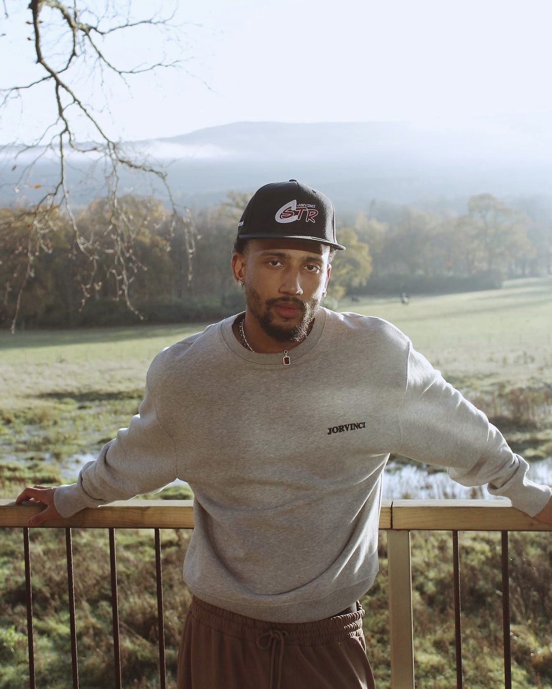Aaron Fife on a countryside terrace on a misty autumn morning