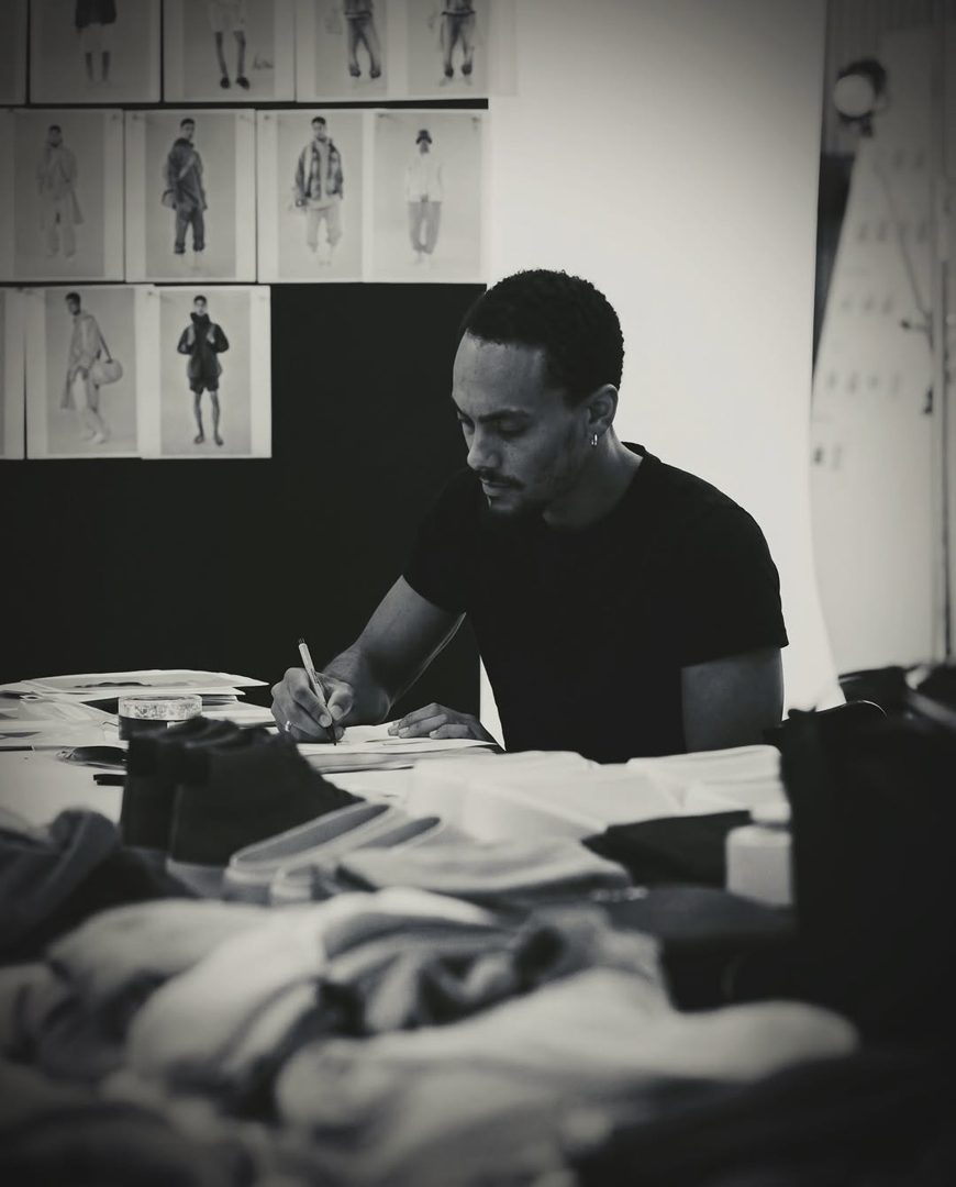 Jordan Fife sketching designs at his studio desk